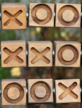 Noughts and crosses game
